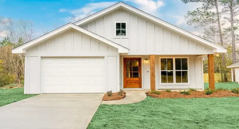 1,292-Square-Foot Three-Bedroom Family Home Plan With Warm, Inviting Style 1