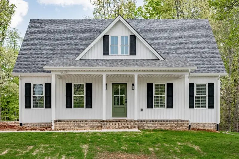 1,703 Sq Ft Four-Bedroom Home Featuring Front Porch And Living Room Fireplace 1